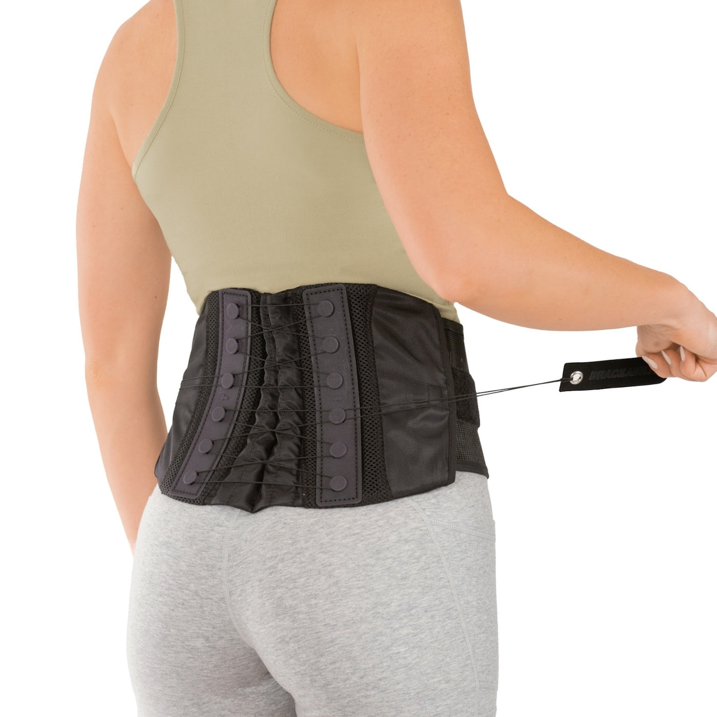 Foto de Orthopedic lumbar corset on the human body. Back brace