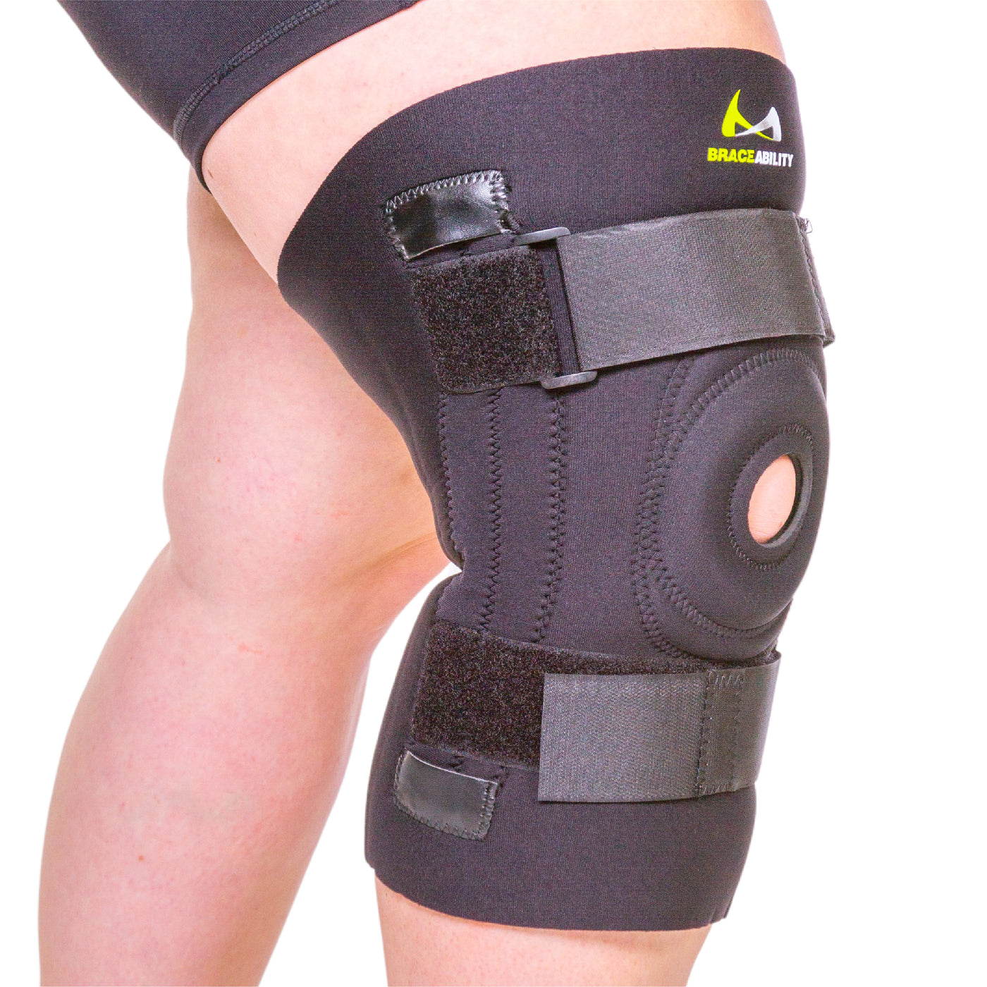 Young Woman Wearing An Adjustable Leg Brace To Support And